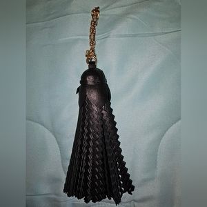 Coach tassel charm